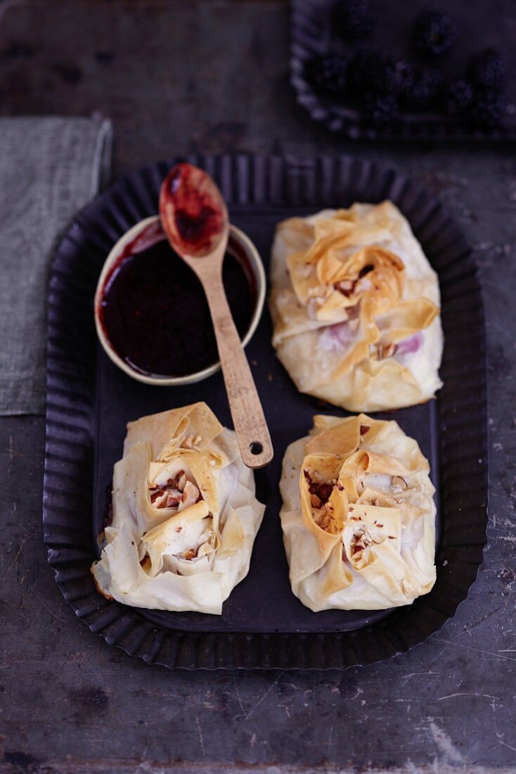 Hazelnut parcels with rosehip sauce