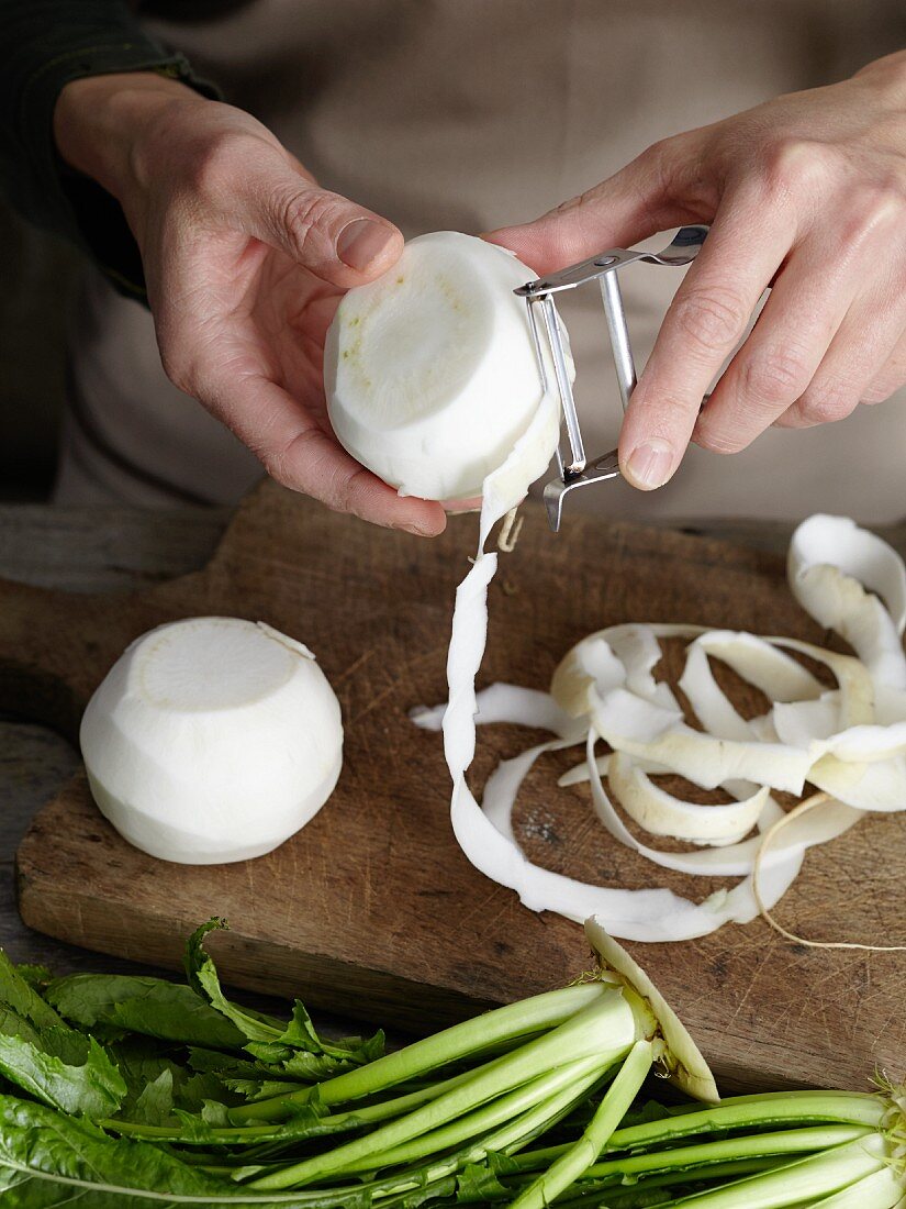 A may turnip being peeled