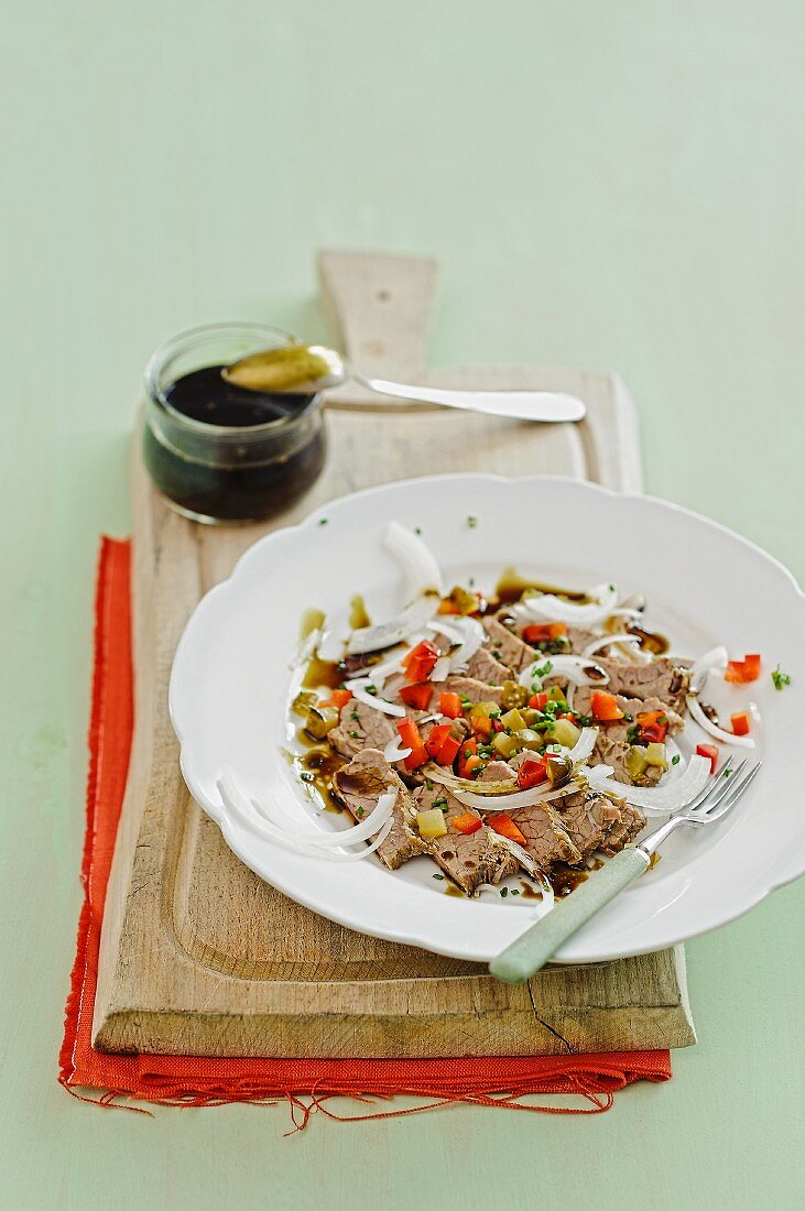 Beef salad with peppers and gherkins