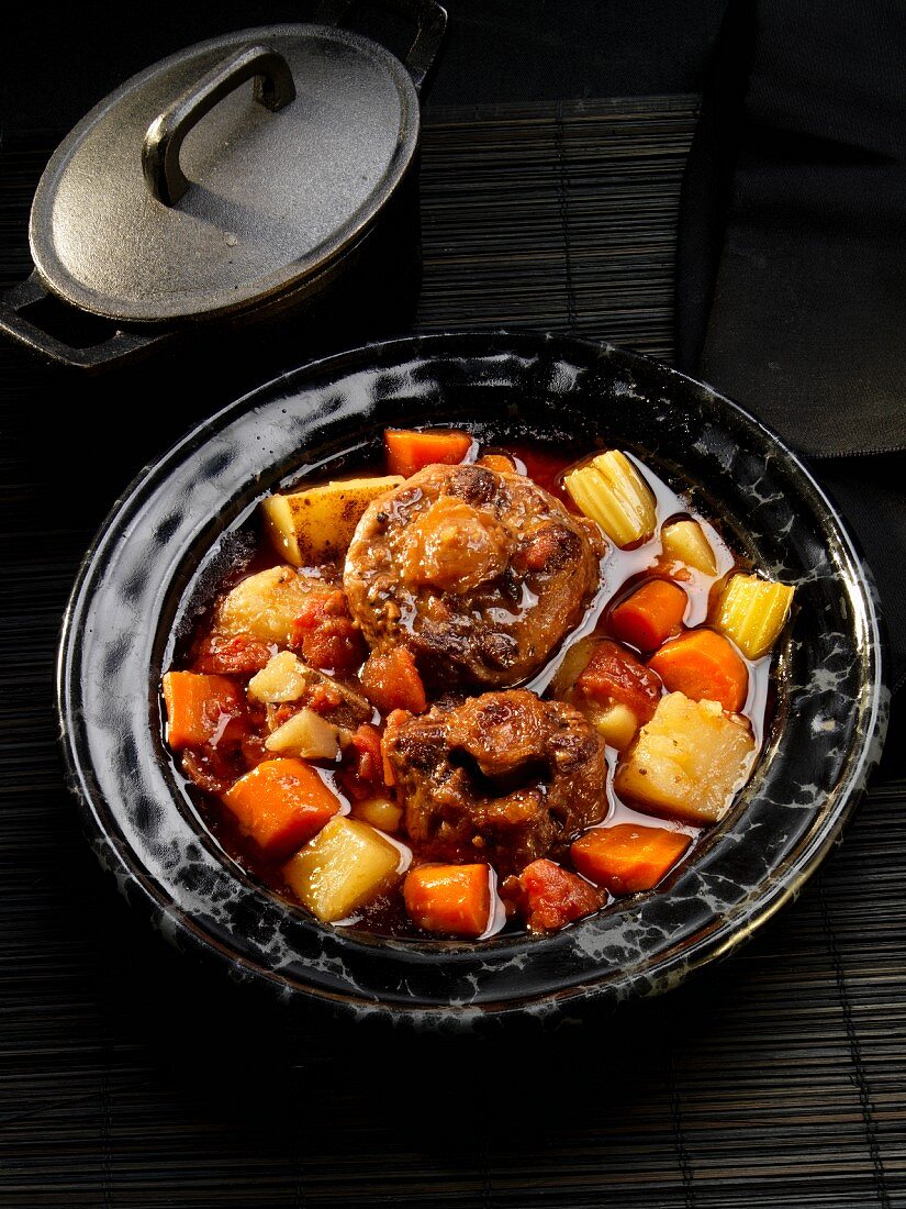 Braised ox tails with root vegetables and celery