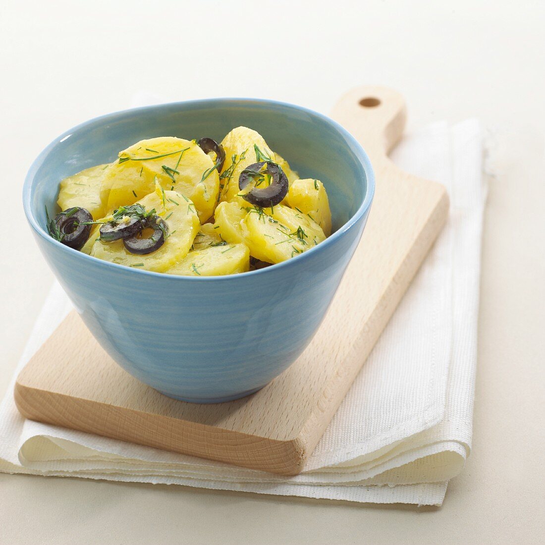 Potato salad with olives and dill
