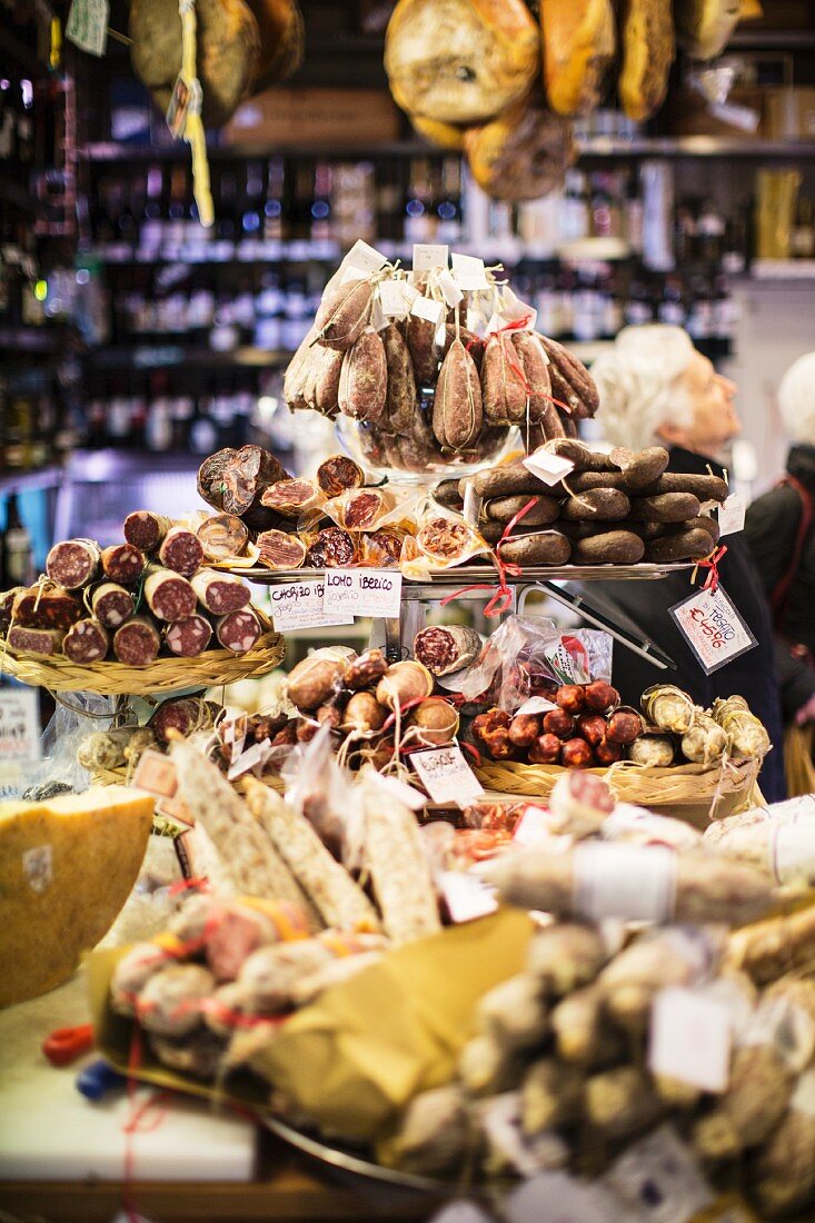 Various cured meats in a delicatessen in Rome
