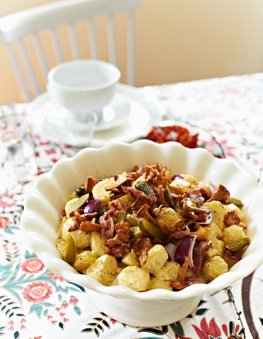Potato salad with chanterelle mushrooms and gherkins