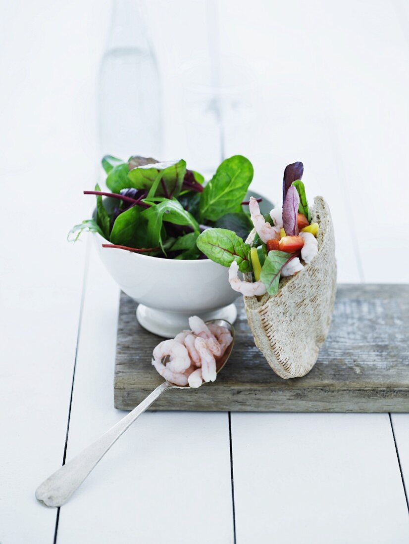 Pita bread filled with prawns and vegetables