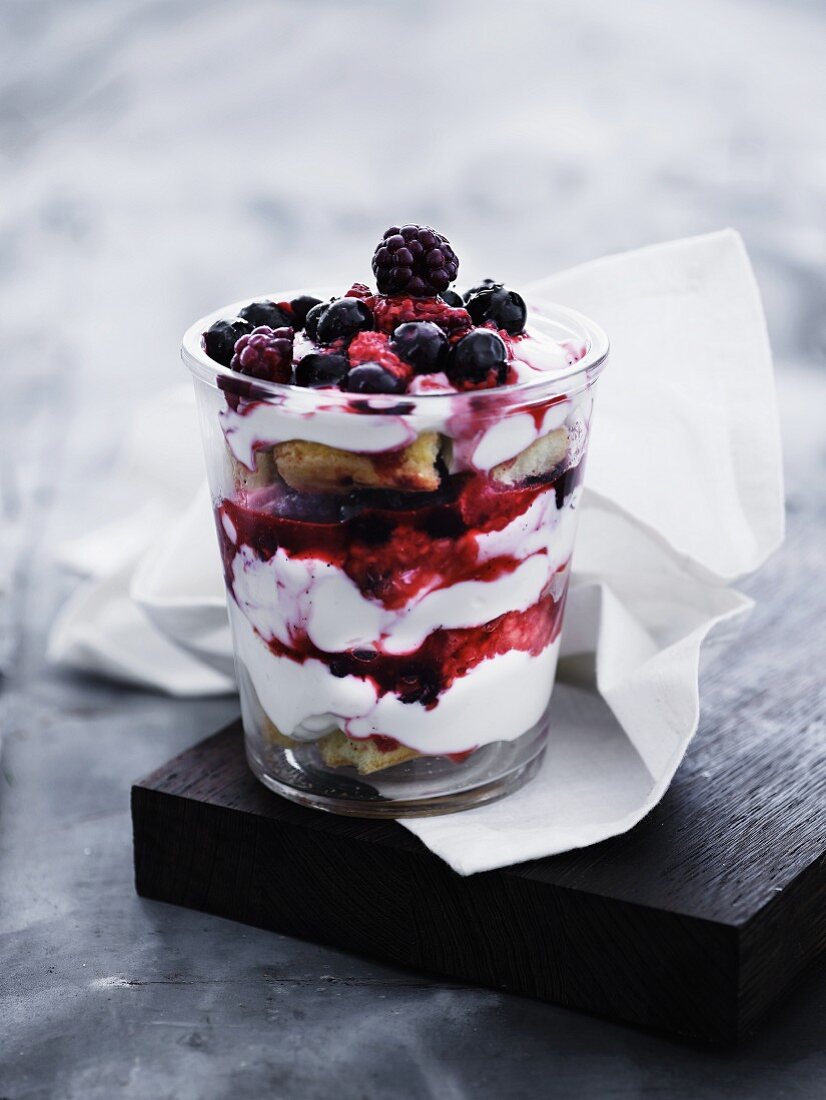 A layered desert with cream and fruits