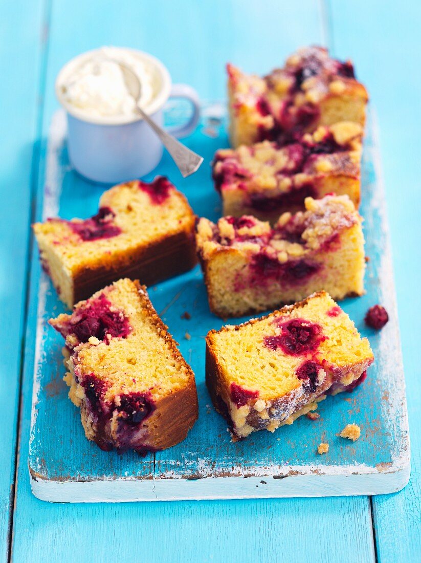 Yeast dough cake with sour cherries and whipped cream