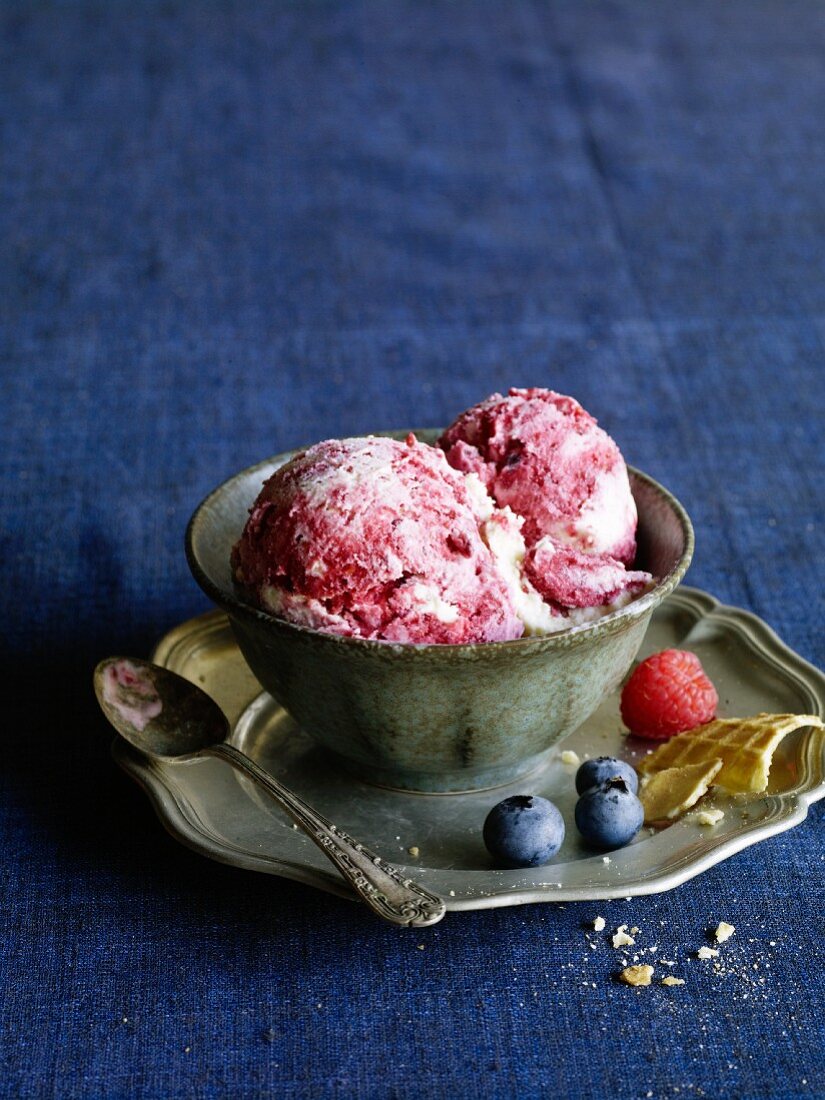 Berry-sour cream ice cream with blueberries and raspberries