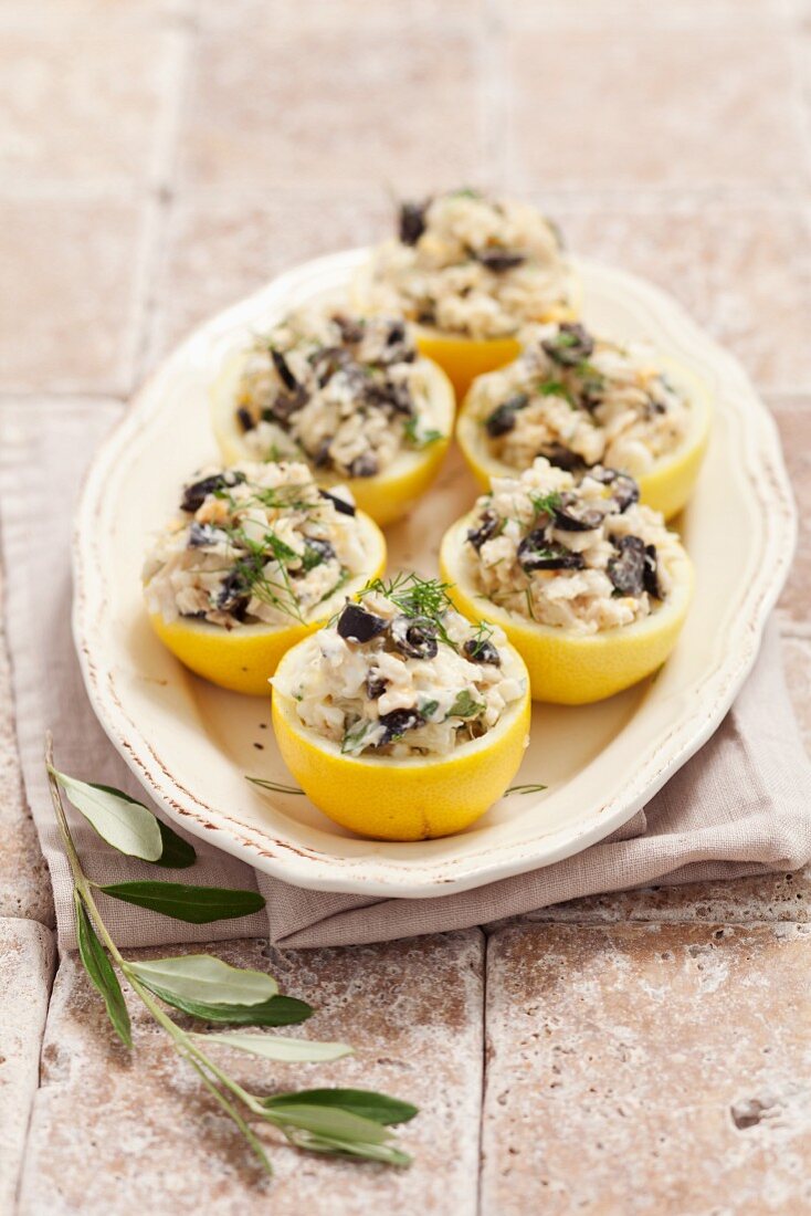 Lemons stuffed with cod and olives