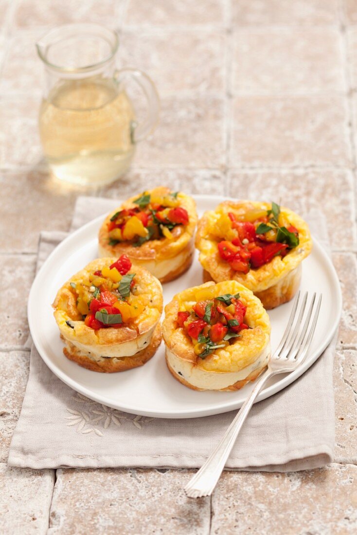 Goats cheese flans with roasted peppers