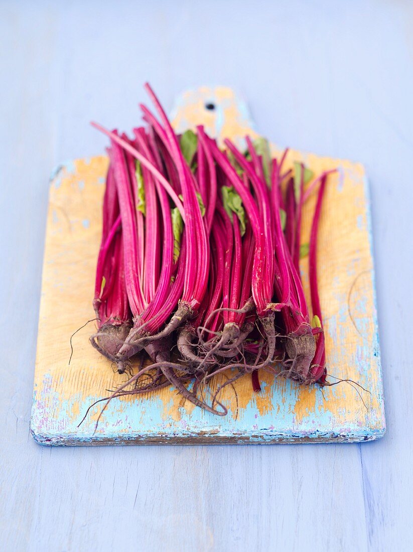 Young beetroot on a chopping board