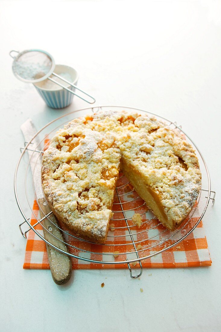 Apricots crumble cake, sliced