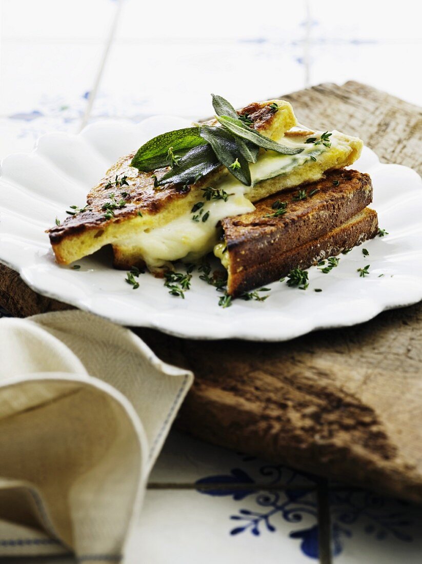 A toasted sandwich with mozzarella and herbs (Italy)