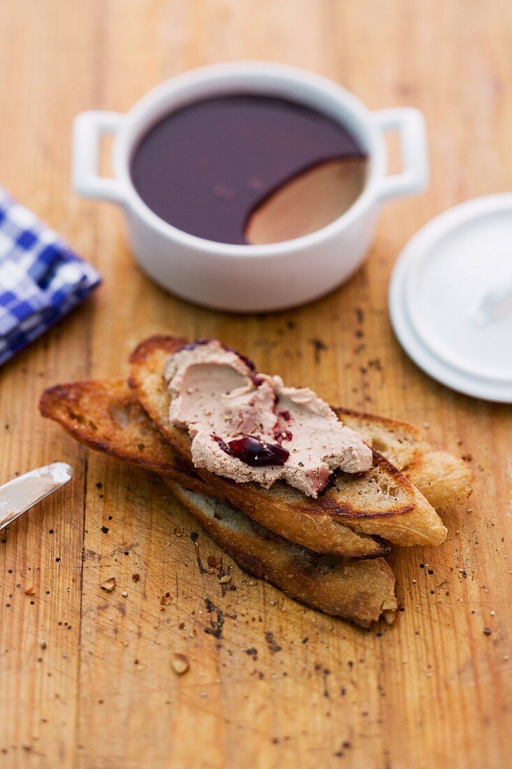 A baguette spread with chicken liver pâté