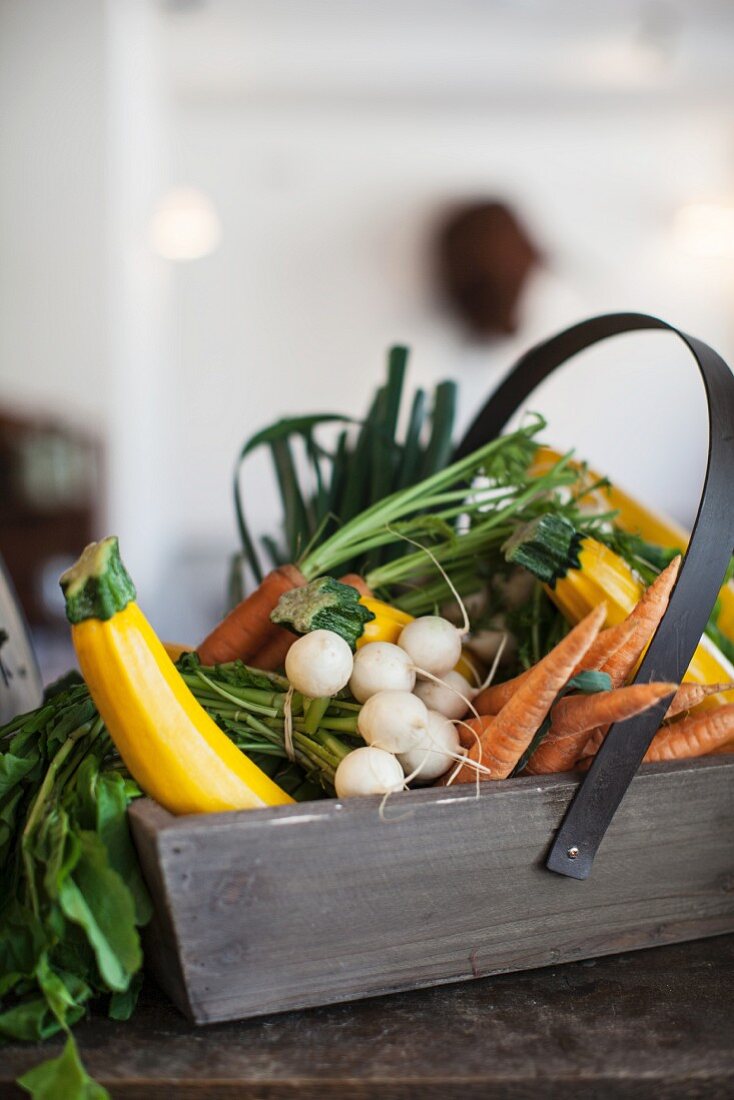 Fresh vegetables in a wooden basket