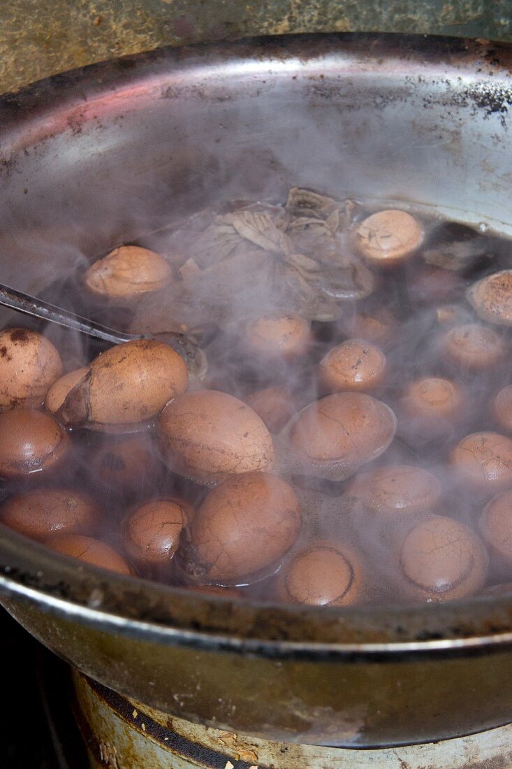 Eggs boiled in tea at a market in China