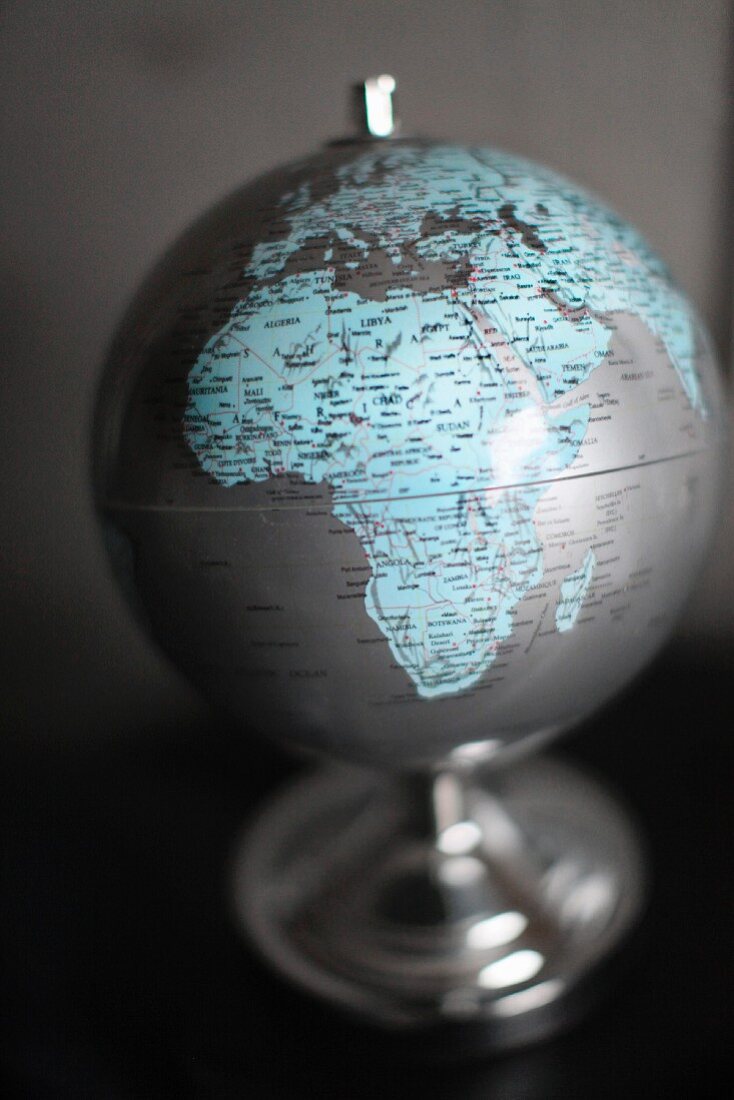 Globe against grey background