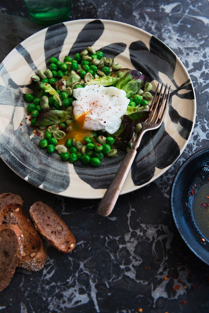 Broad bean and pea salad with poached egg