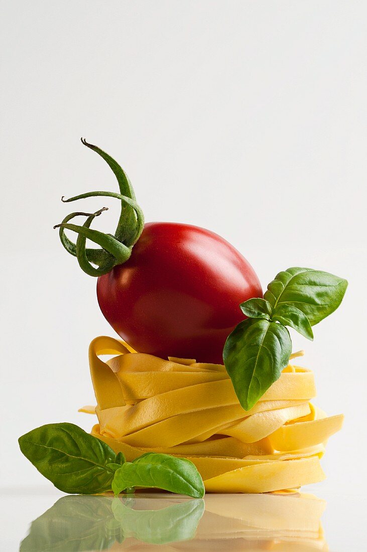 A tomato and basil on tagliatelle