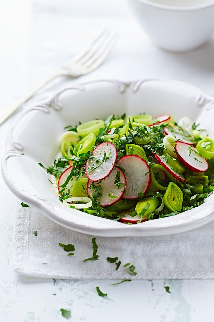 Radish and leek salad with fresh parsley