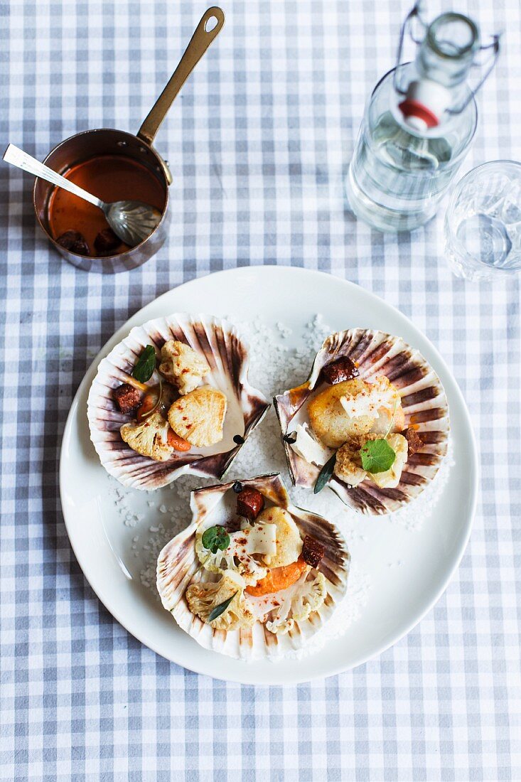 Grilled scallops served in shells