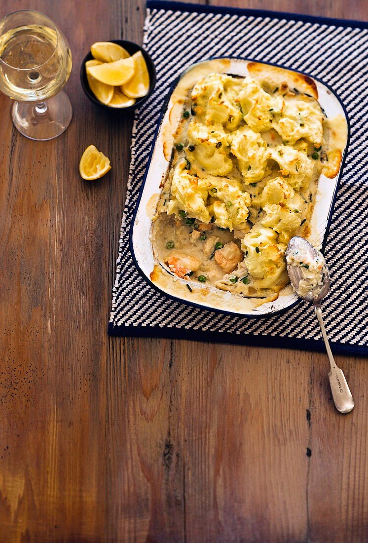 Fish casserole with spring onion and mashed potatoes