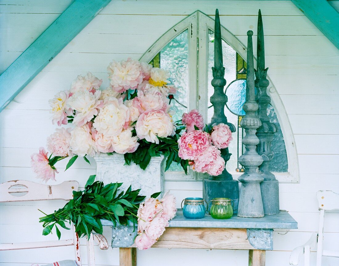 Peonies on altar table in shrine