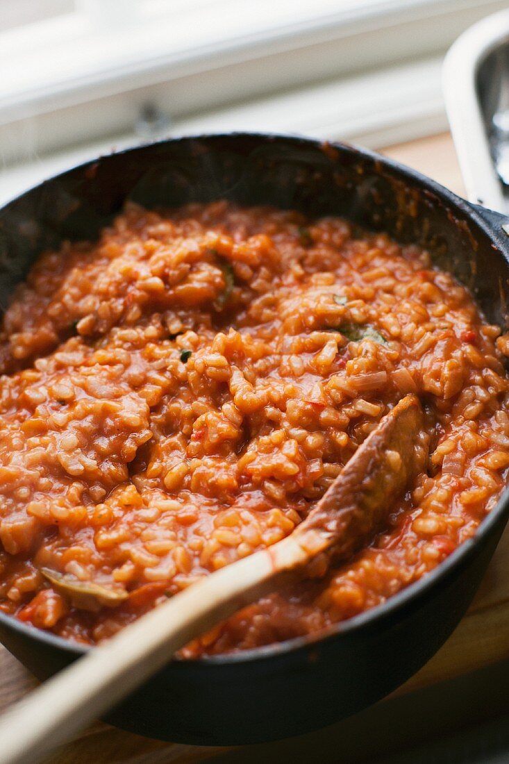 Tomato risotto in a pan