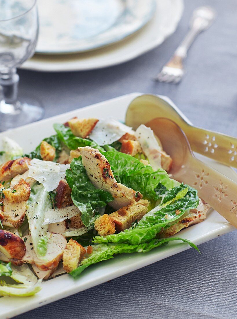 Caesar salad with chicken strips