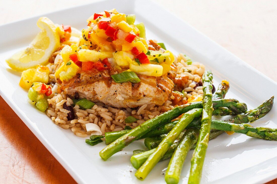 Swordfish with pineapple and pepper chutney, rice and asparagus