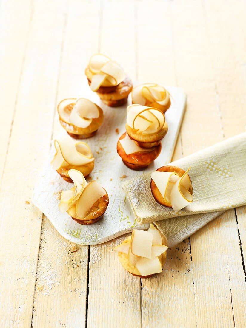 Mini cheesecakes topped with pear