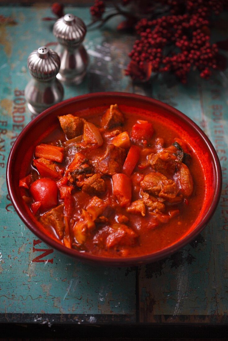 Pork goulash with tomatoes and pepper