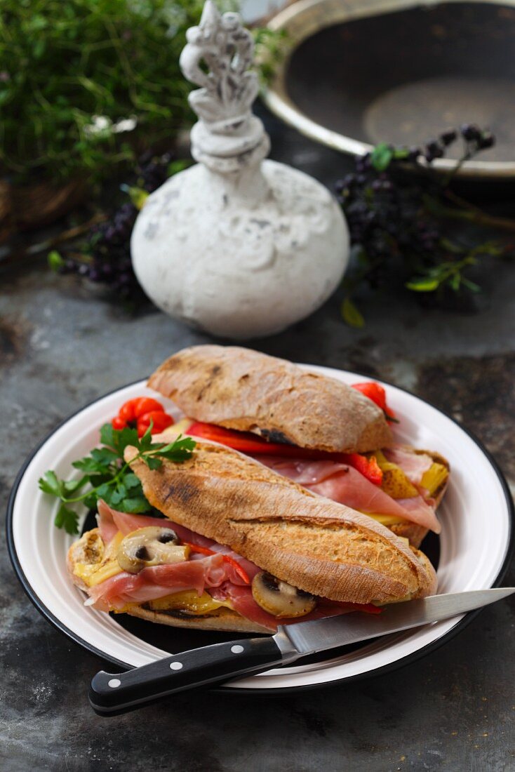 Baguette sandwiches with ham, mushrooms and pepper
