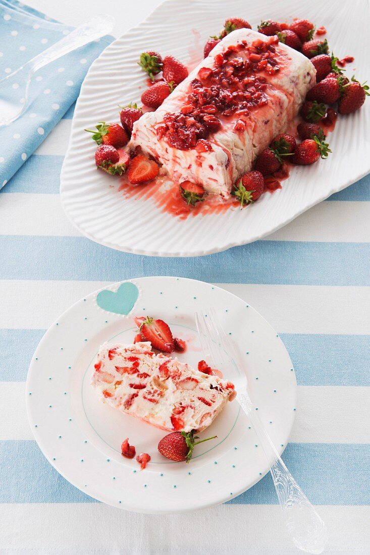 An ice cream dessert with berries and meringue