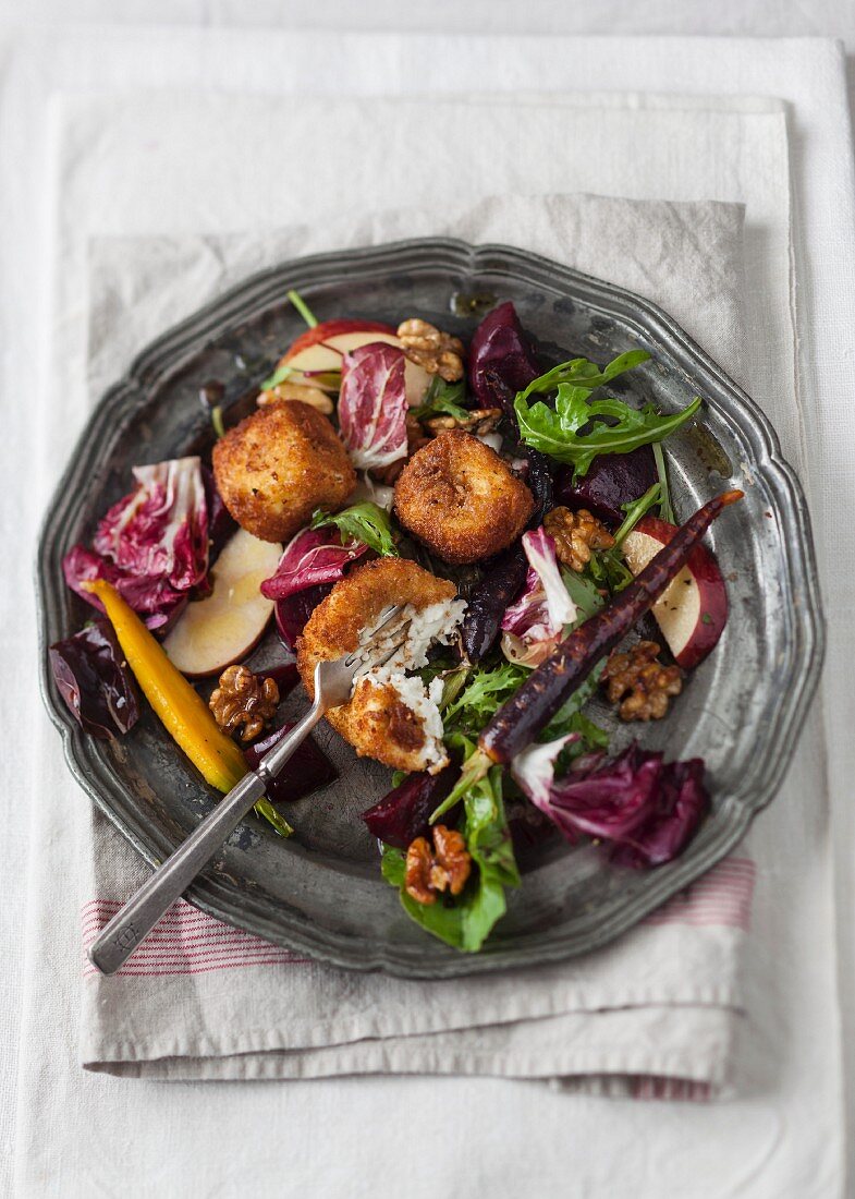 An autumnal salad with fried goat's cheese