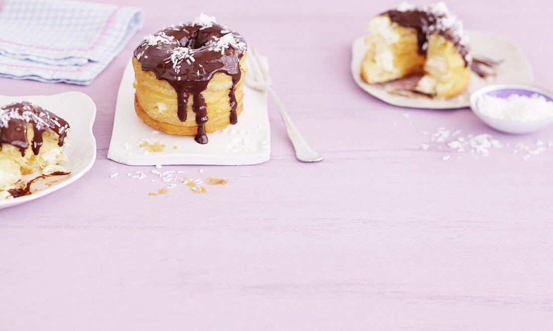Croissant-Doughnuts with coconut cream and chocolate glaze