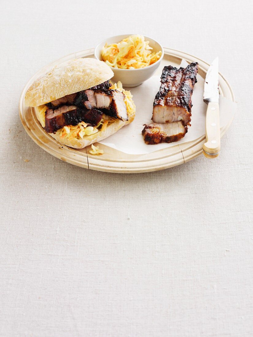 A spare rib sandwich with coleslaw