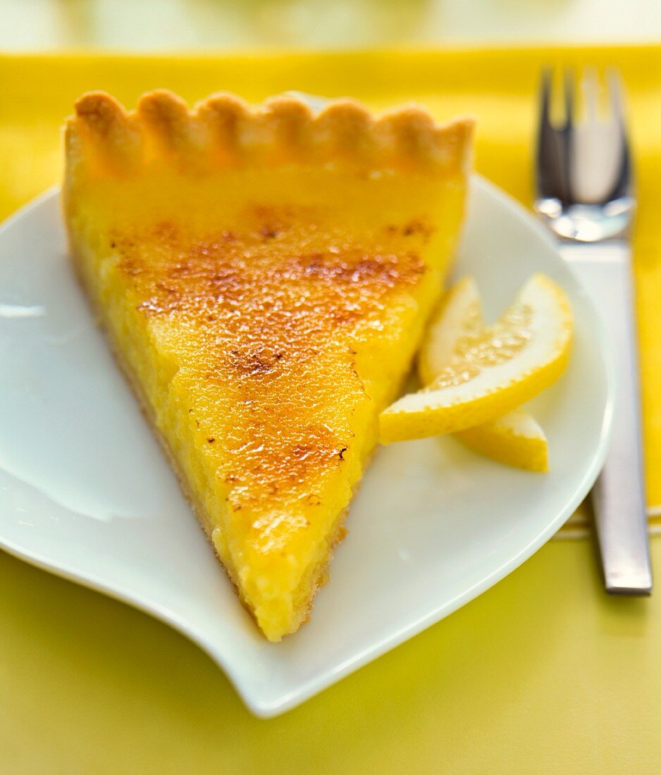 A slice of caramelised lemon tart