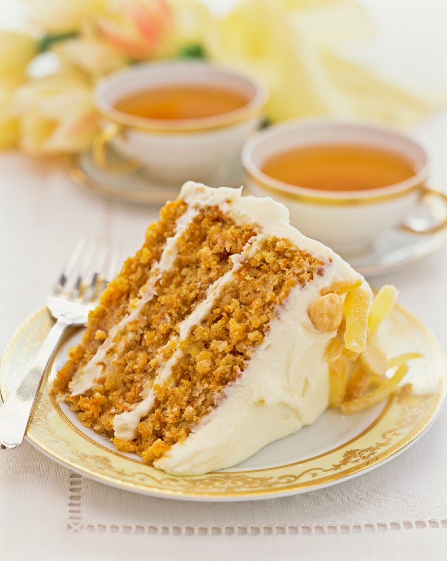 A slice of carrot cake with candied ginger