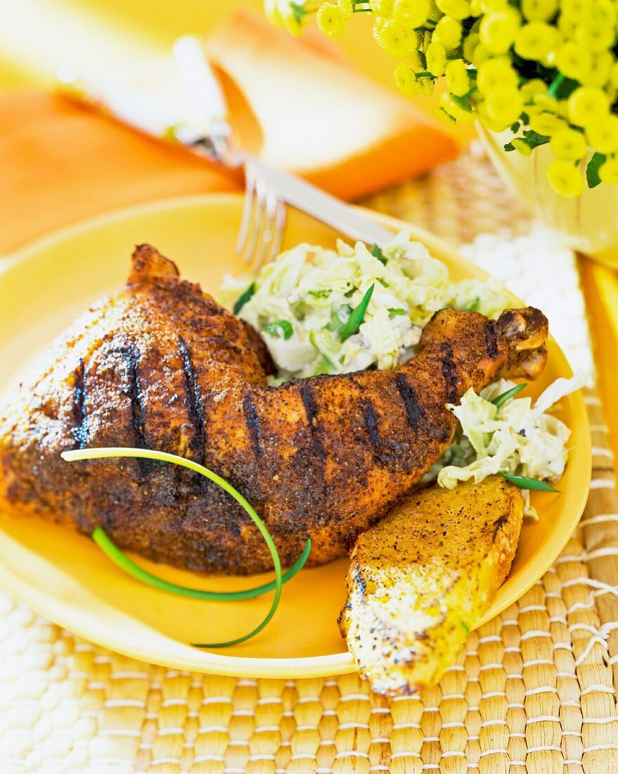 Grilled chicken leg with a cabbage salad