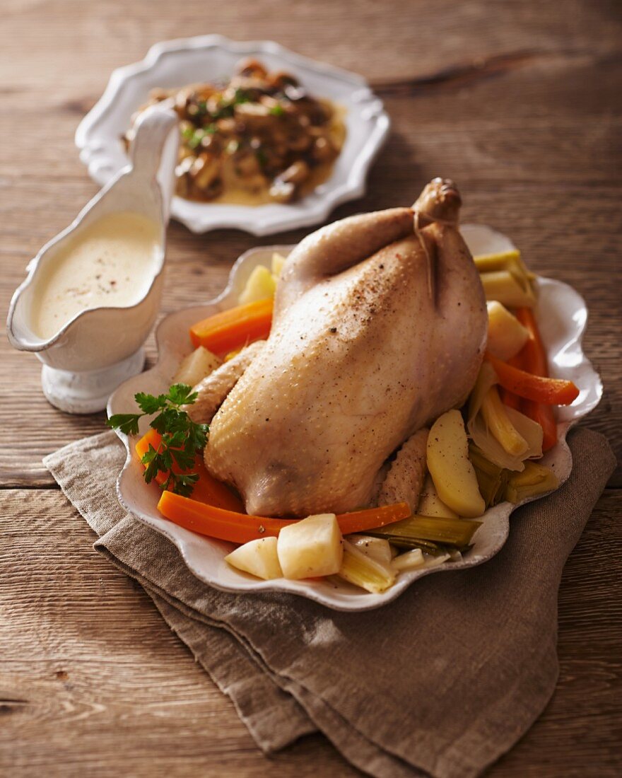 Roast chicken with vegetables and Béchamel sauce