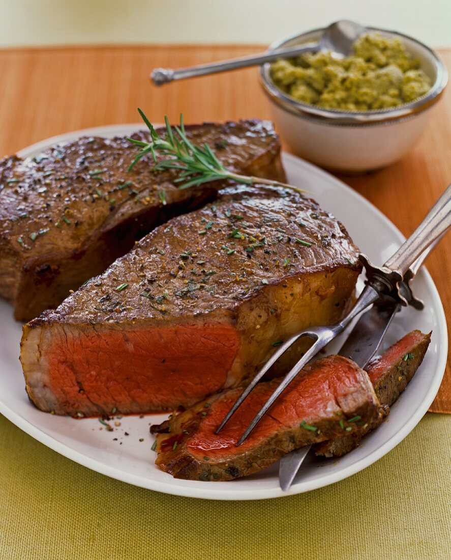 Beefsteak with rosemary, sliced