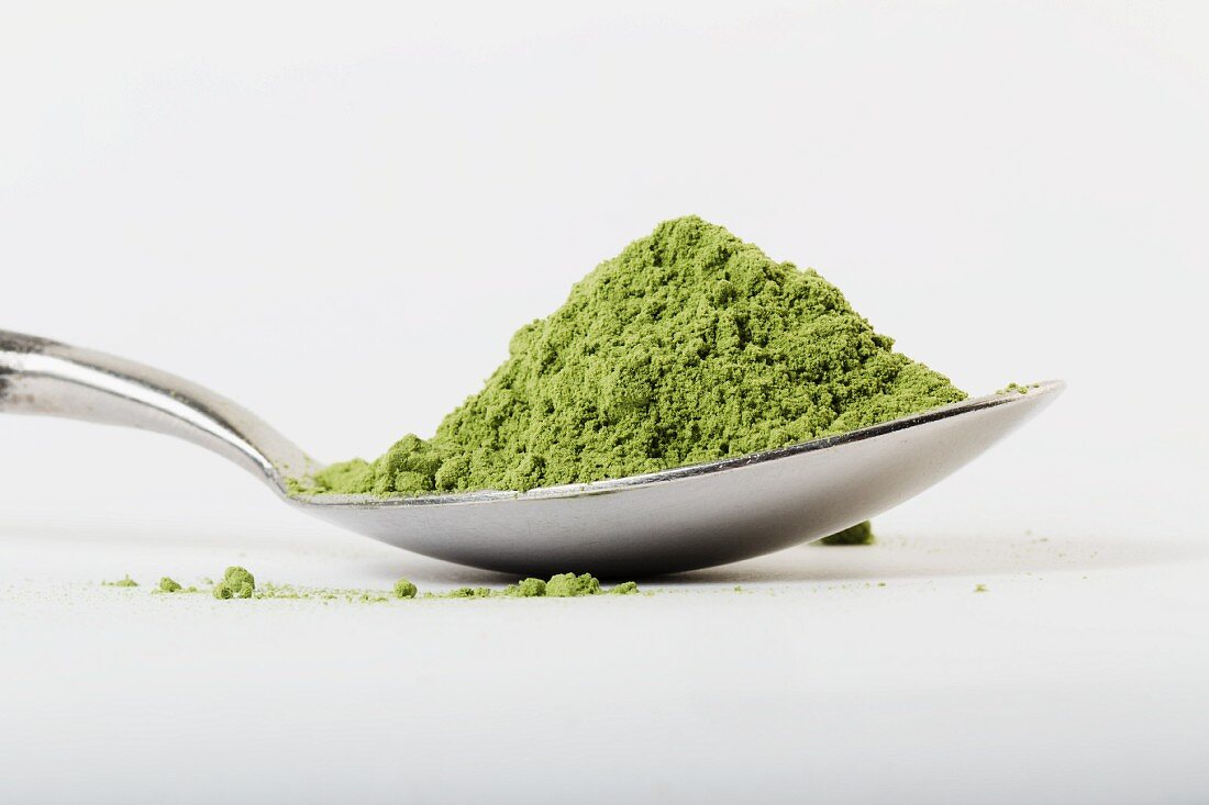 A spoonful of wheatgrass powder for juices or smoothies