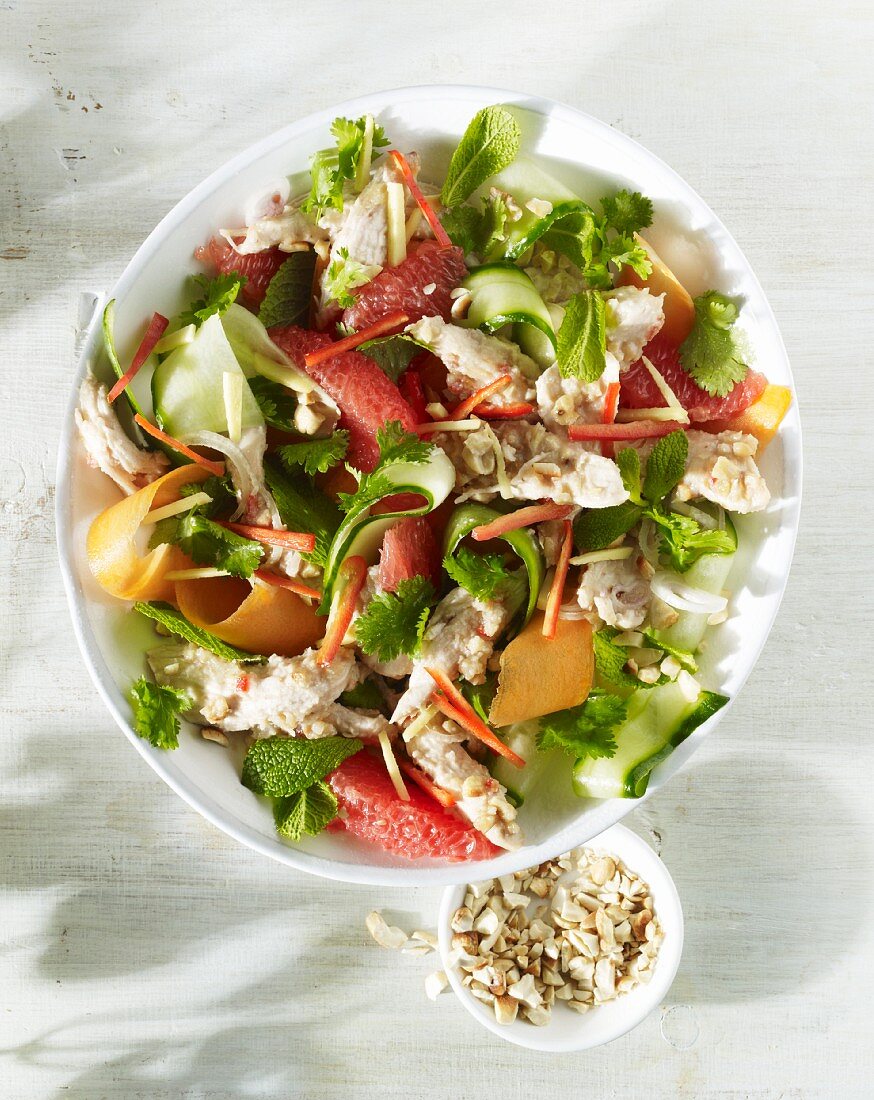 An oriental salad with cucumber, grapefruit and coriander