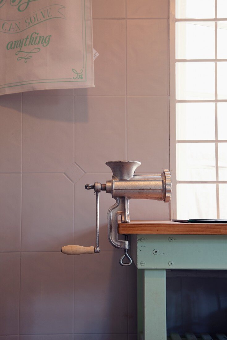 Vintage atmosphere - mincer clamped to kitchen table