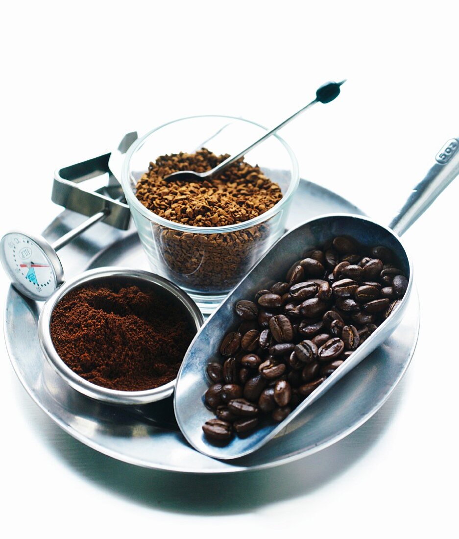 An arrangement of coffee beans, ground coffee and instant coffee