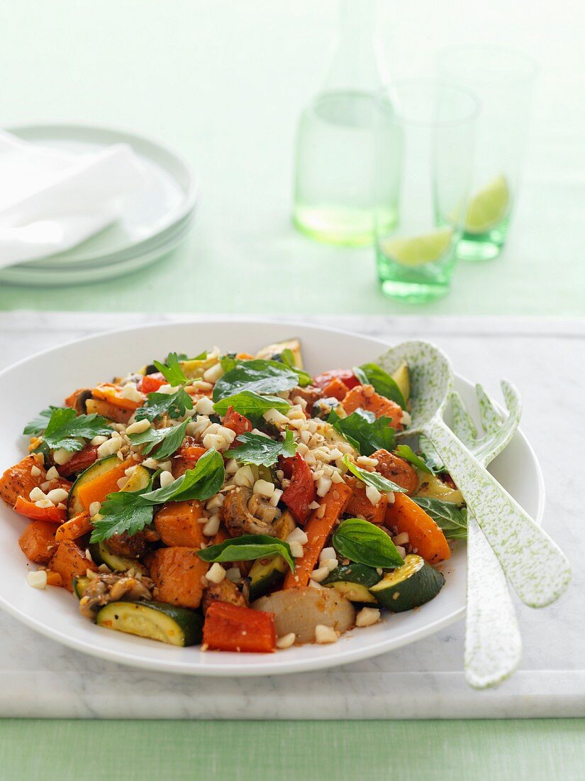 Sweet and spicy oven-roasted vegetables with fresh herbs