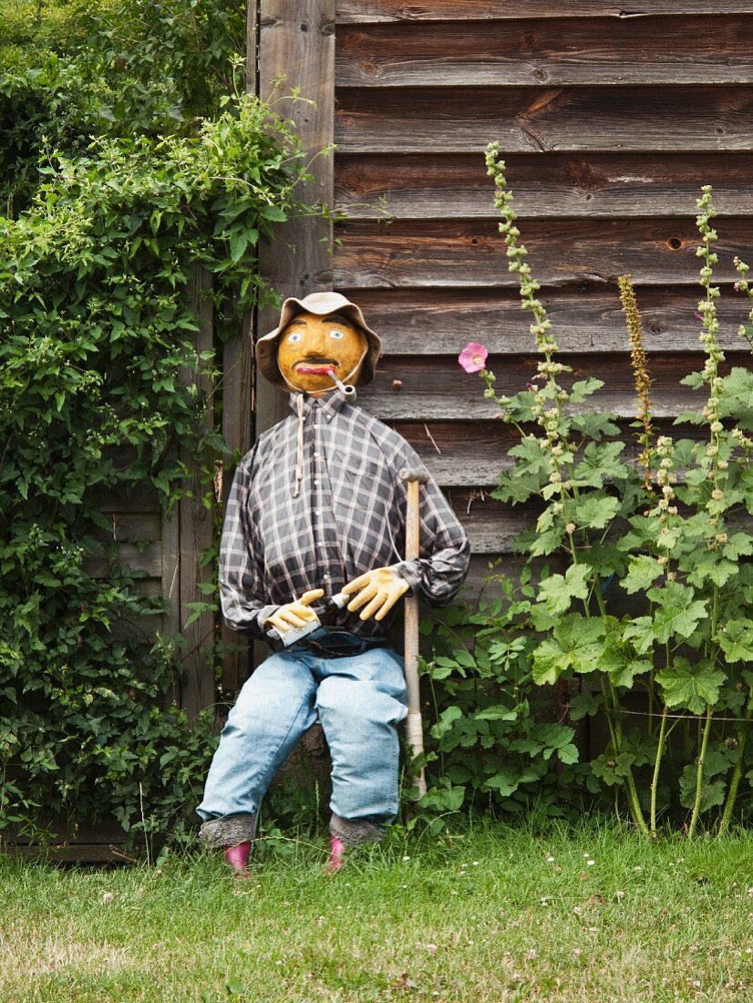Seated scarecrow