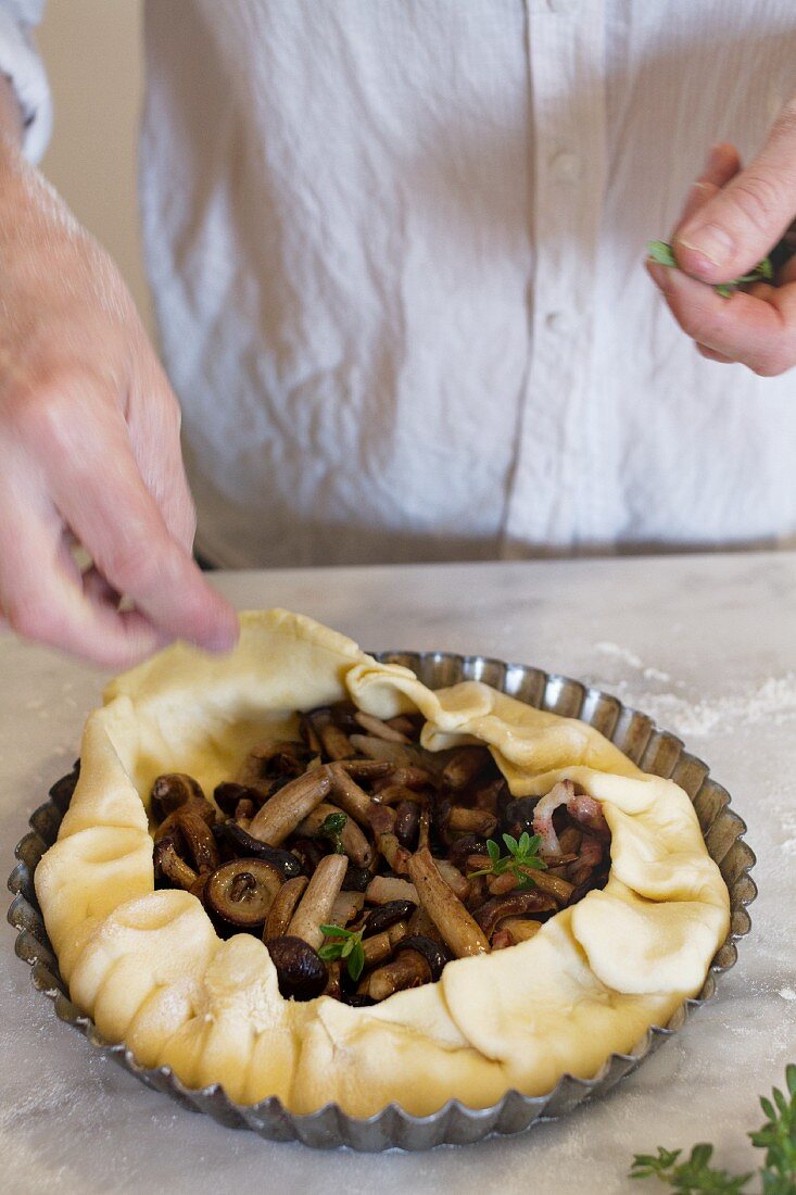 An unbaked mushroom pie