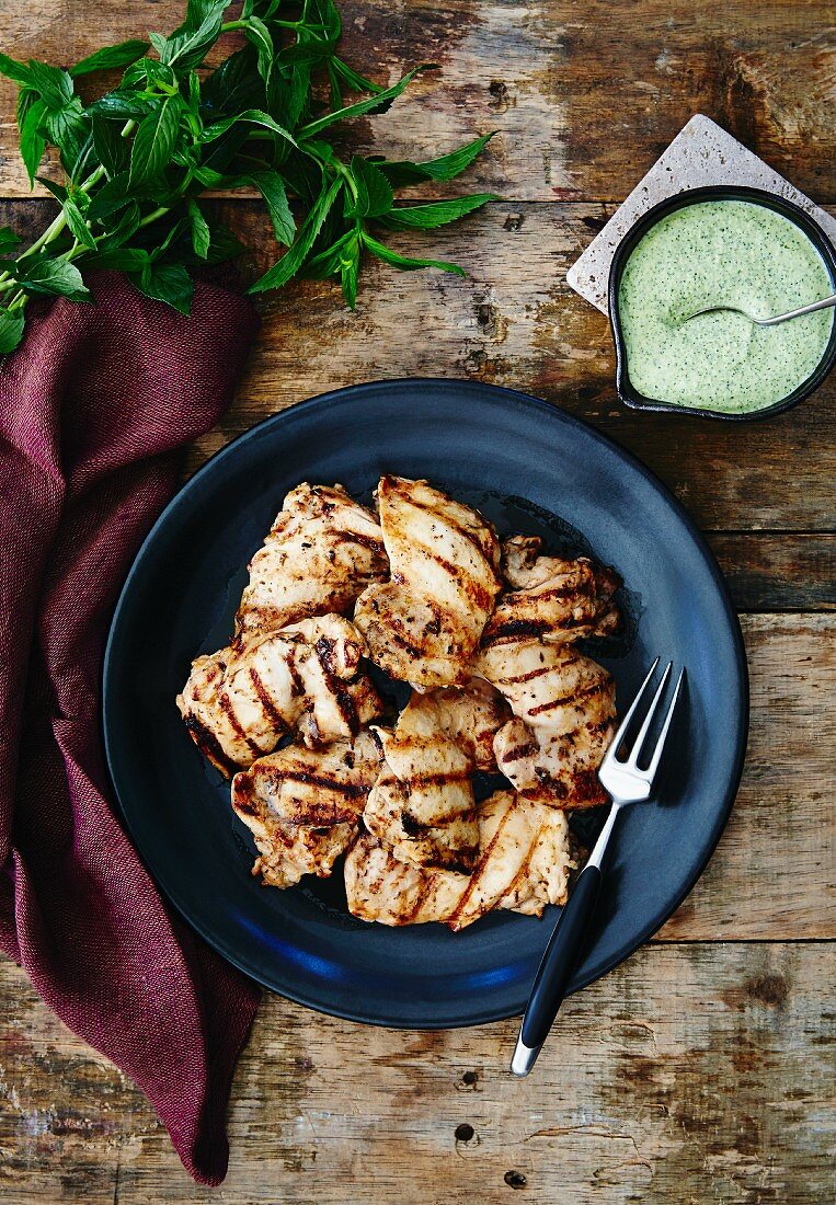 Grilled chicken legs with a mint and yoghurt sauce