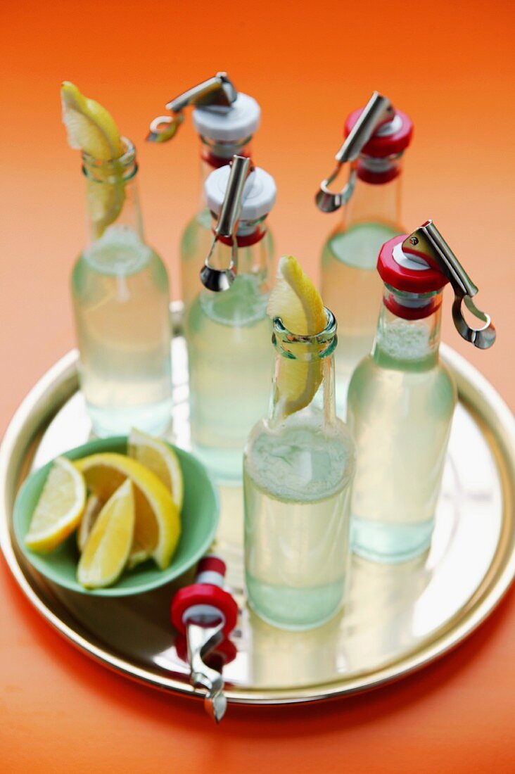 Bottles of lemonade on a tray